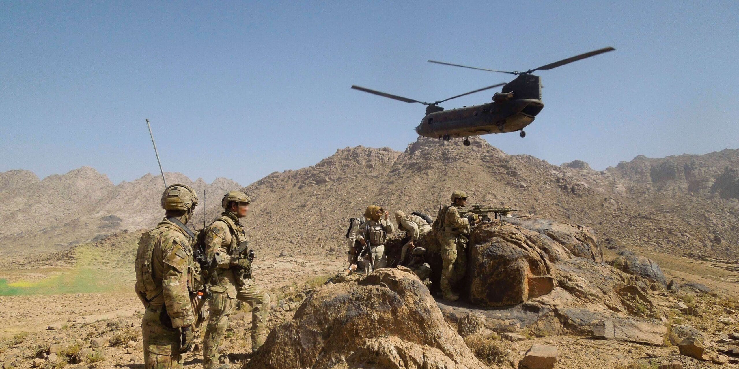 2012 - Afghanistan - extraction from the Belly-Button feature - Heston sitting back to the rock recovering from severe gastro